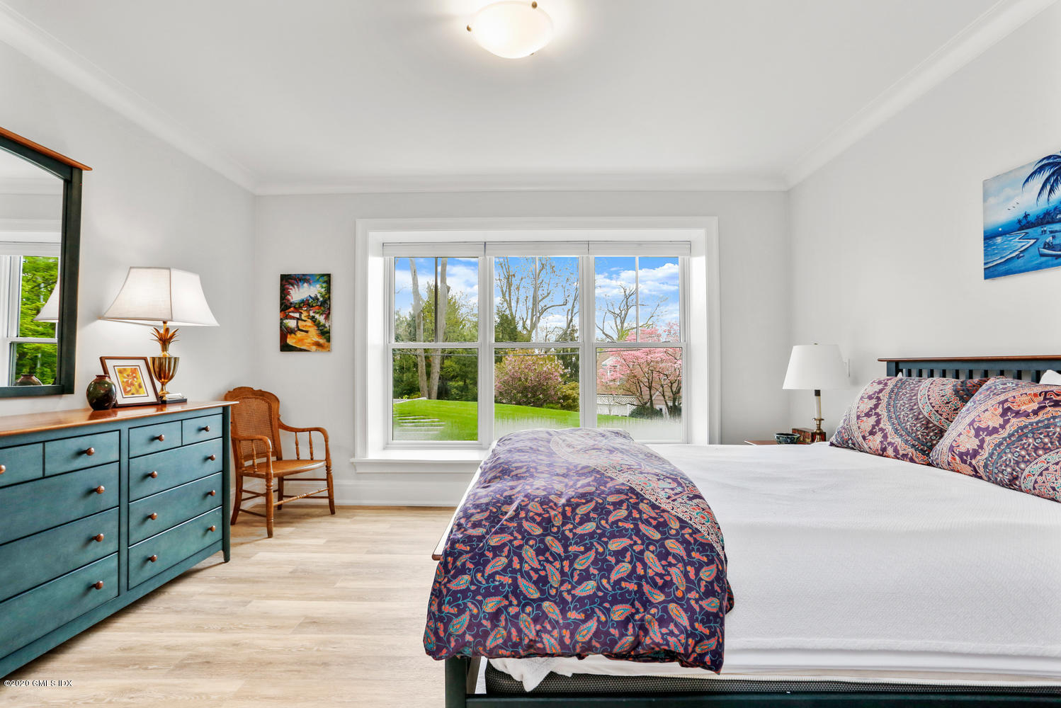 6 Perkley Lane Riverside, CT 06878 - Photo 40 of 52 a bedroom with a large bed and a window