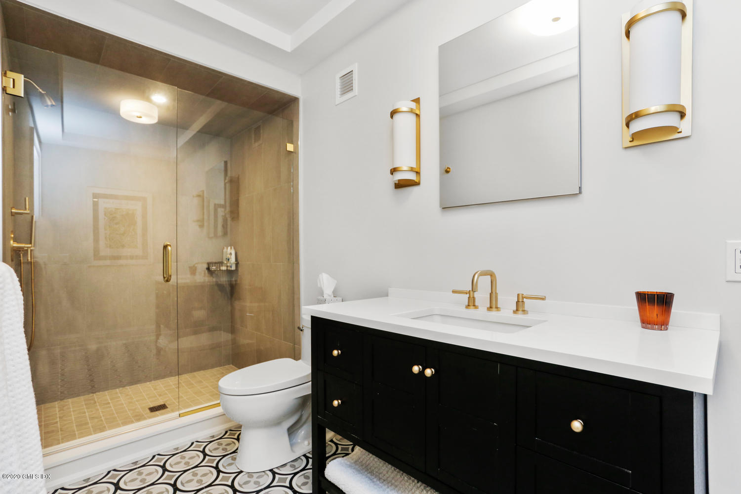 6 Perkley Lane Riverside, CT 06878 - Photo 41 of 52 a bathroom with a sink vanity toilet and shower