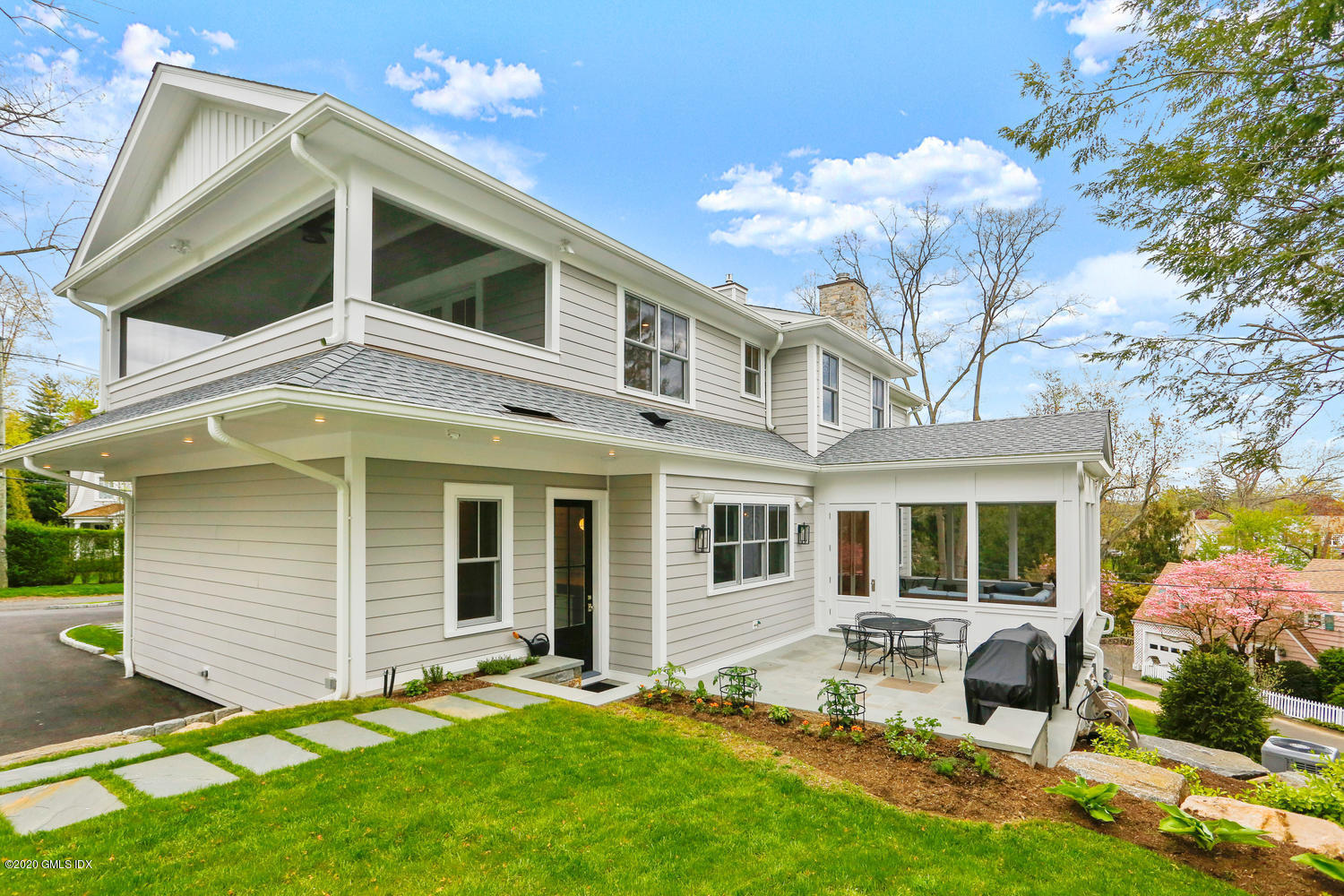 6 Perkley Lane Riverside, CT 06878 - Photo 42 of 52 a front view of a house with a yard