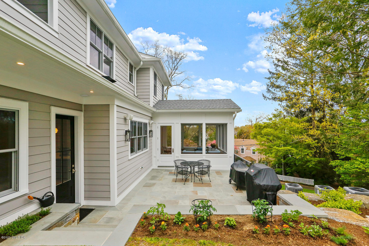 6 Perkley Lane Riverside, CT 06878 - Photo 43 of 52 a view of a house with patio outdoor seating