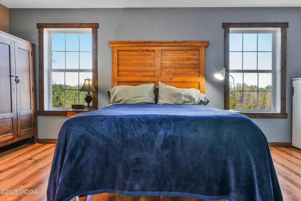 a room with a bed and a window