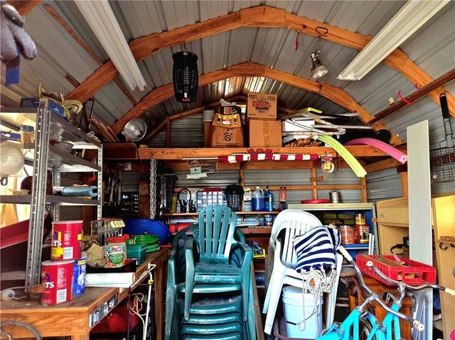 a view of a patio with wooden floor