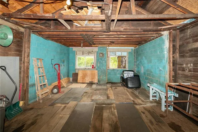 a front view of a house with a garage