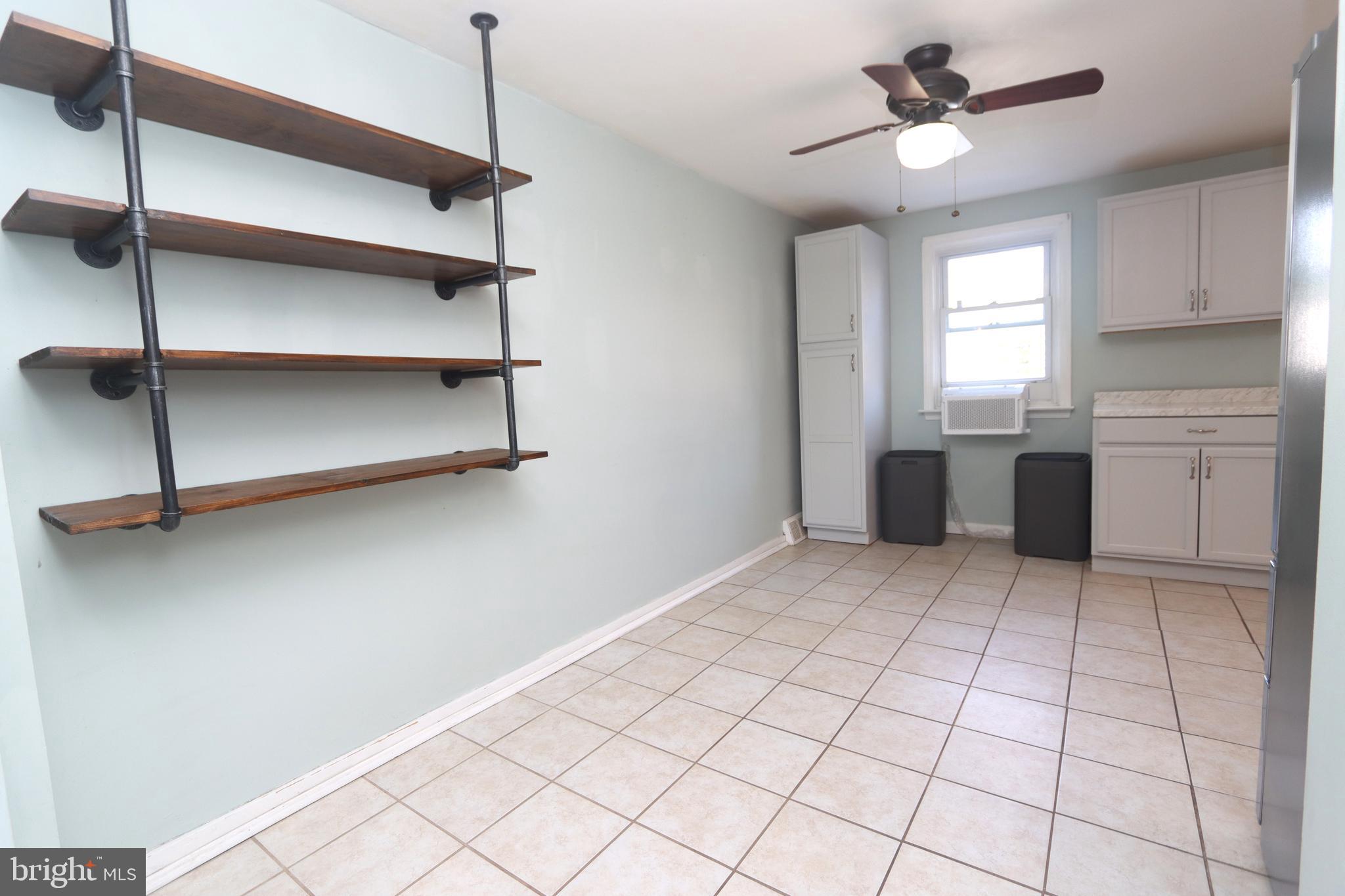 1012 Wells Street Conshohocken, PA 19428 - Photo 13 of 29 a view of an empty room with a window