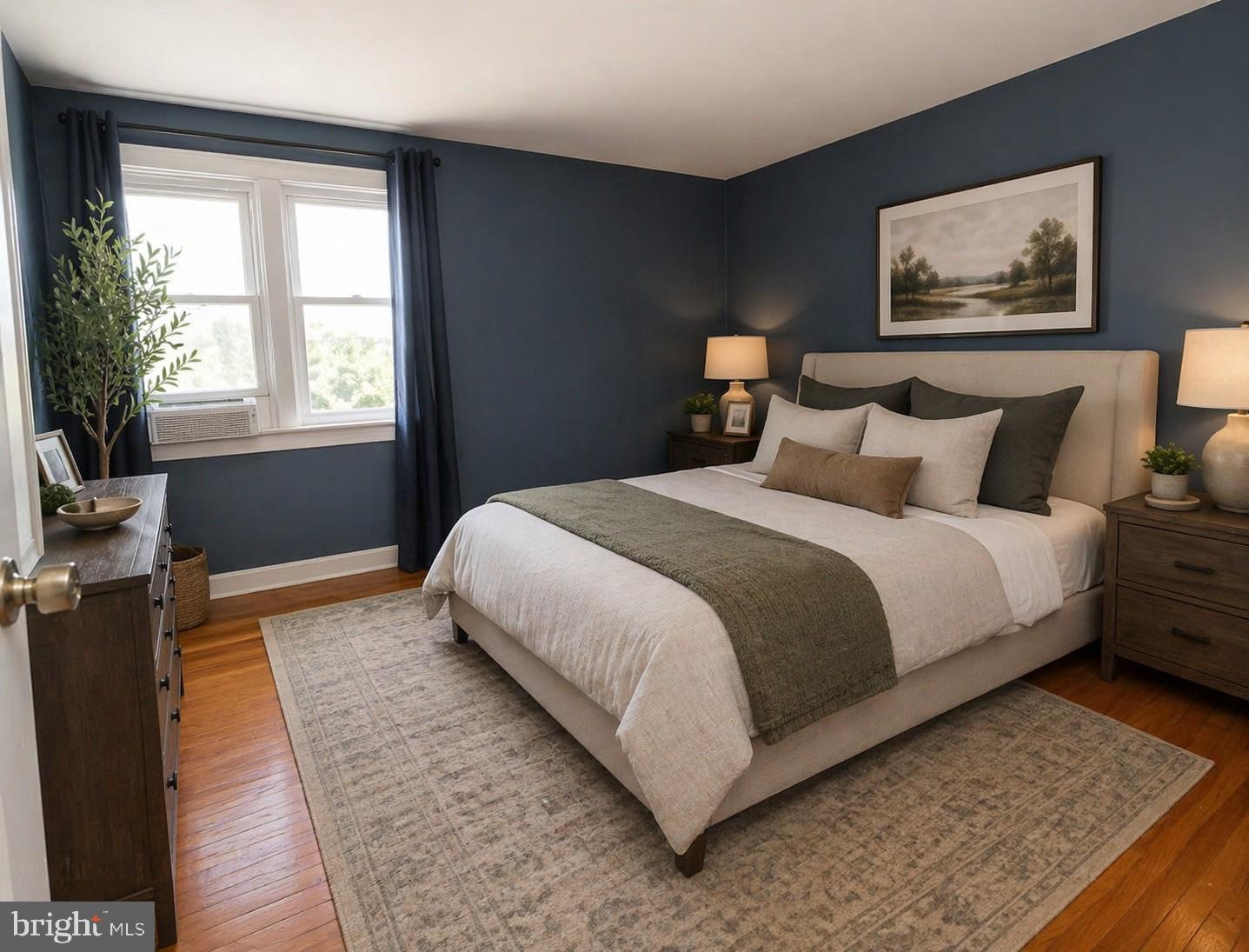 1012 Wells Street Conshohocken, PA 19428 - Photo 15 of 29 a bedroom with bed and wooden floor