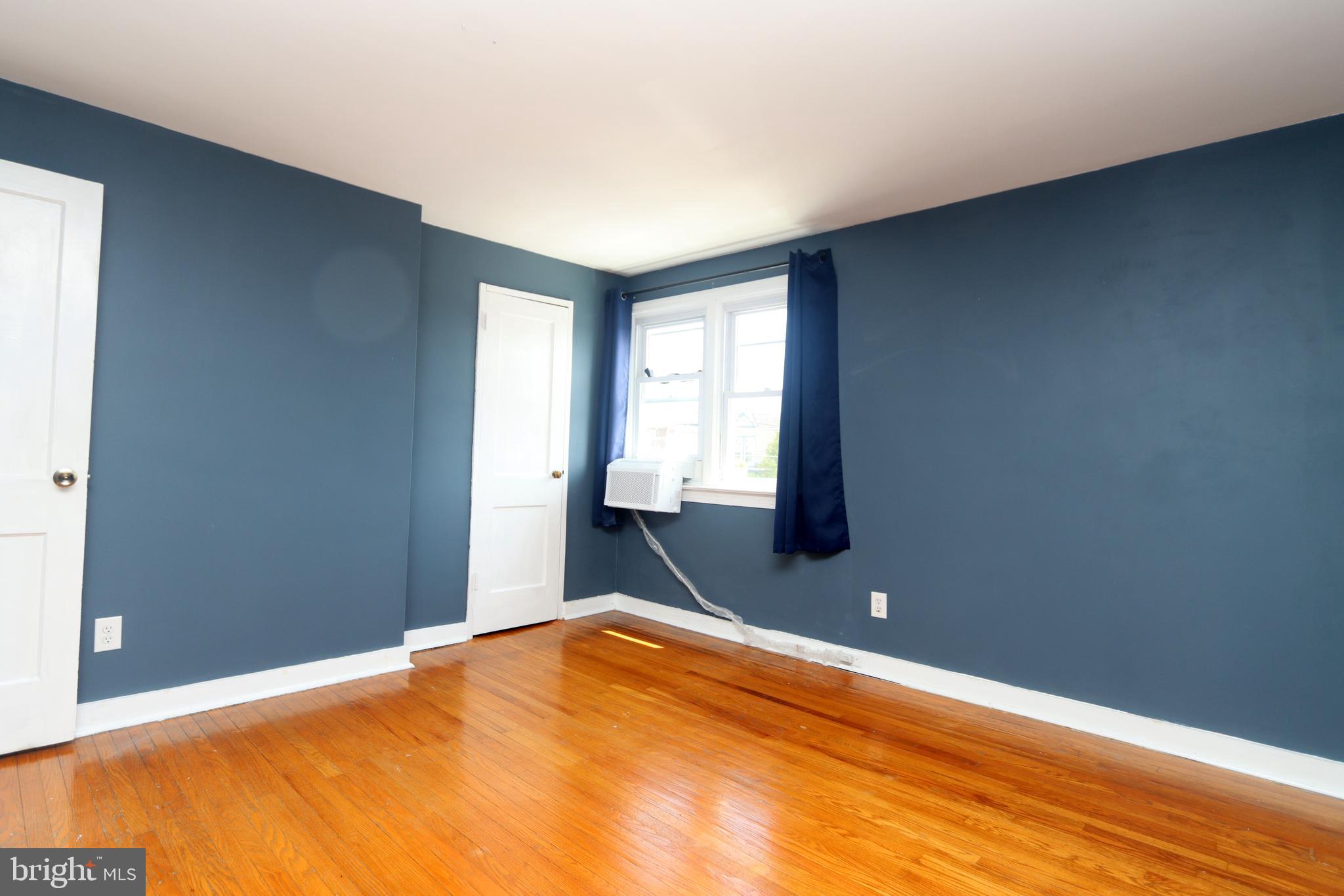 1012 Wells Street Conshohocken, PA 19428 - Photo 17 of 29 a bedroom with a bed and a window