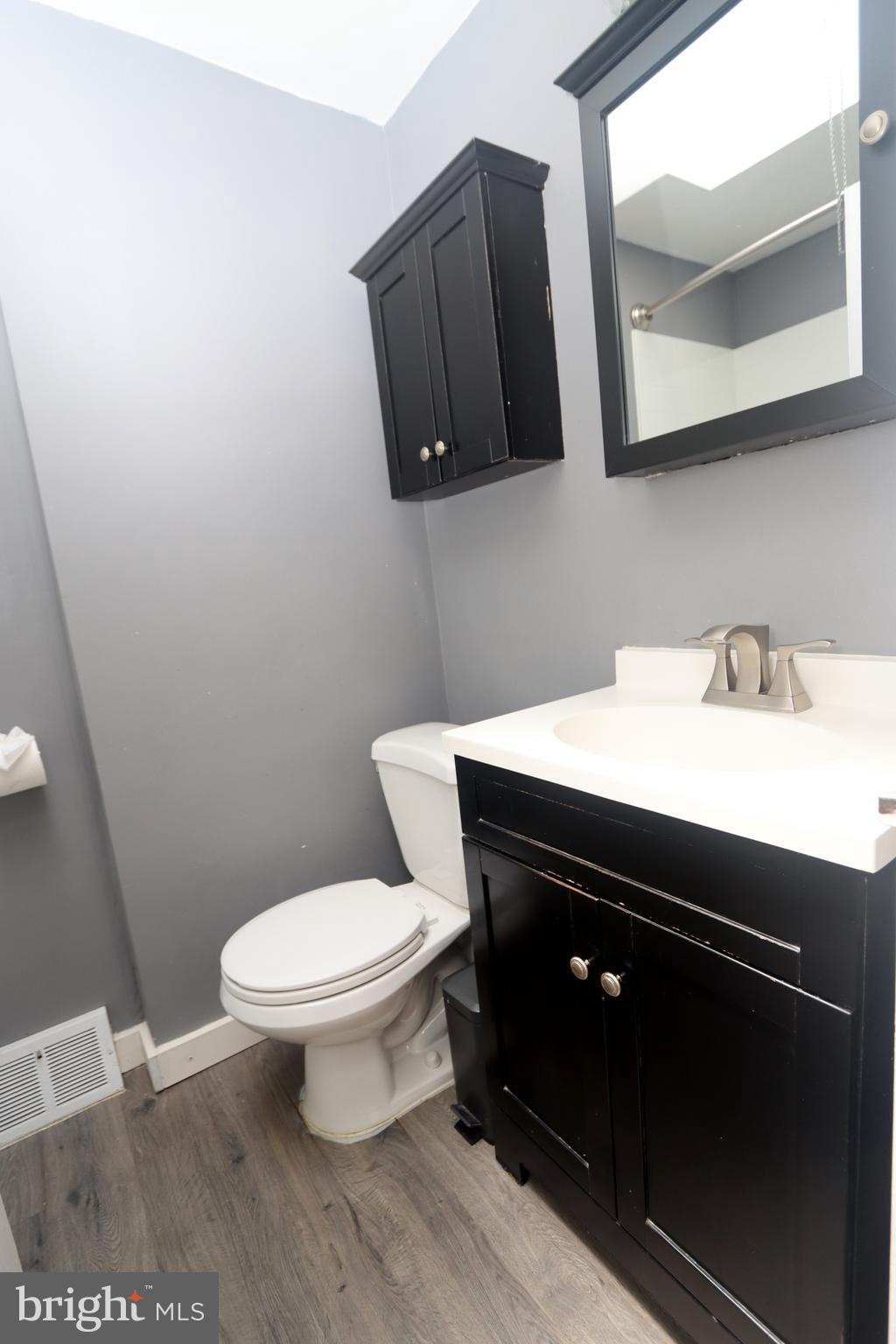 1012 Wells Street Conshohocken, PA 19428 - Photo 23 of 29 a bathroom with a sink and a toilet