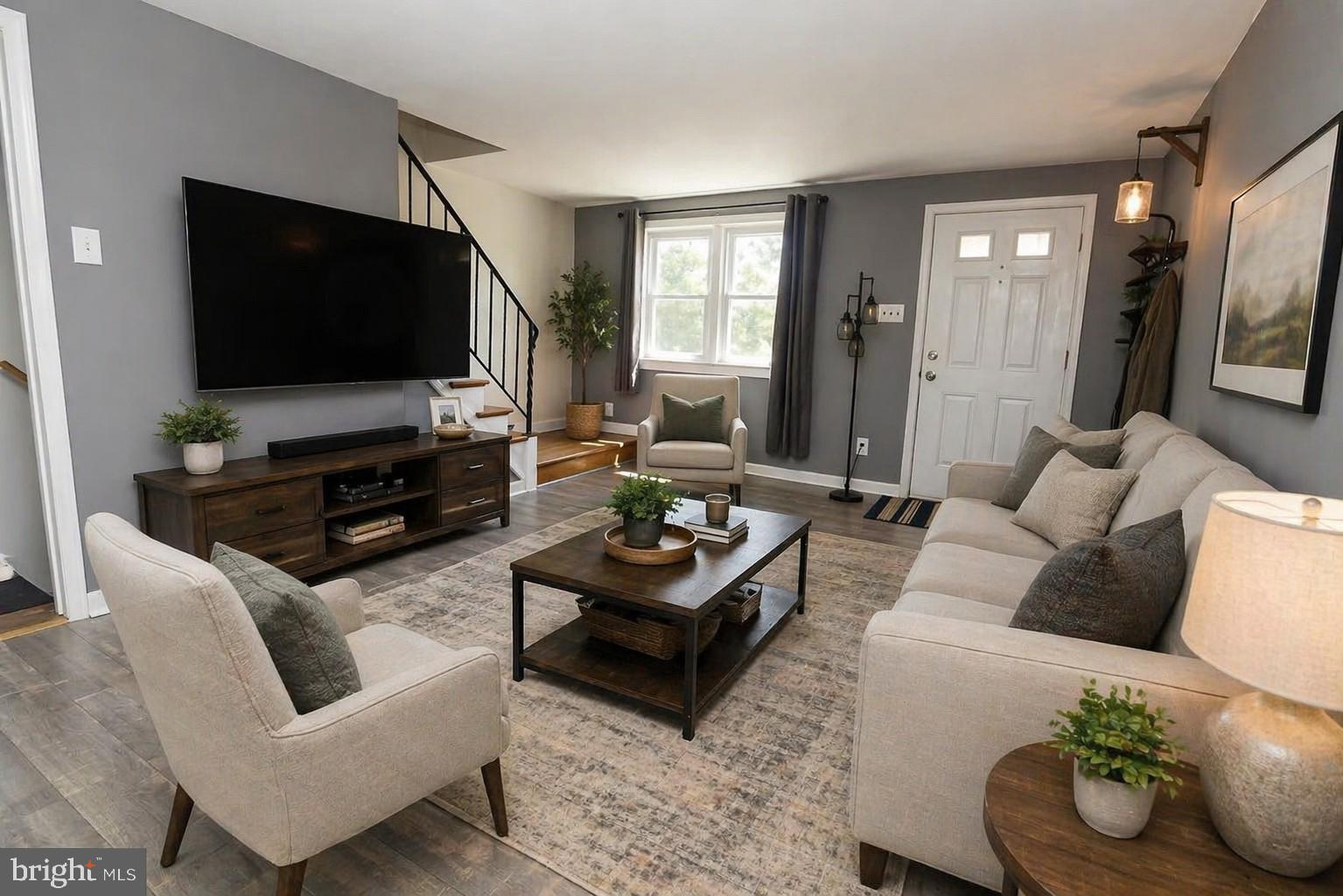 1012 Wells Street Conshohocken, PA 19428 - Photo 3 of 29 a living room with furniture and a flat screen tv