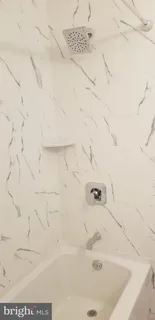 a bathroom with a bathtub