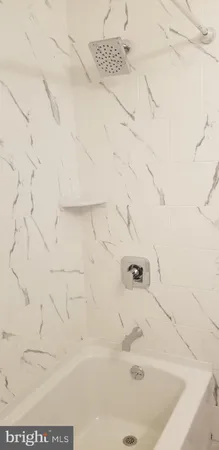 a bathroom with a bathtub