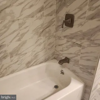 a bathroom with a bathtub
