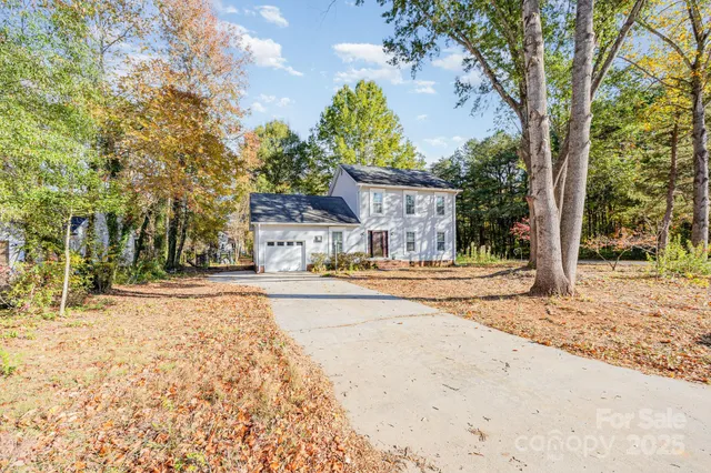 a house with trees in front of it
