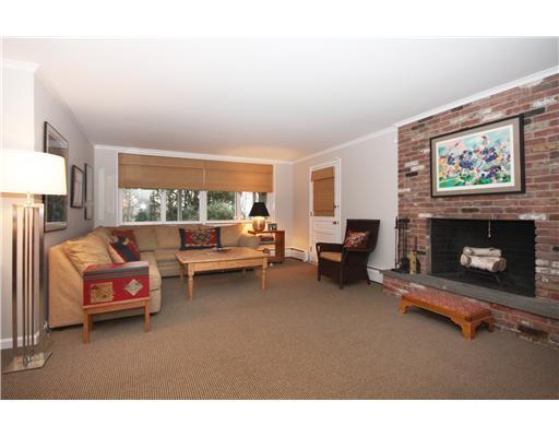 58 Stanton Road Darien, CT 06820 - Photo 15 of 17 a living room with furniture a window and a fireplace