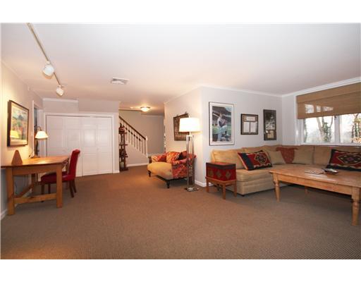 58 Stanton Road Darien, CT 06820 - Photo 16 of 17 a living room with furniture and a dining table