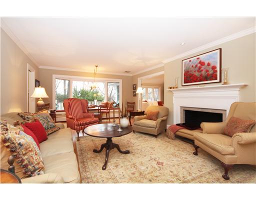 58 Stanton Road Darien, CT 06820 - Photo 5 of 17 a living room with furniture or couch and a fireplace
