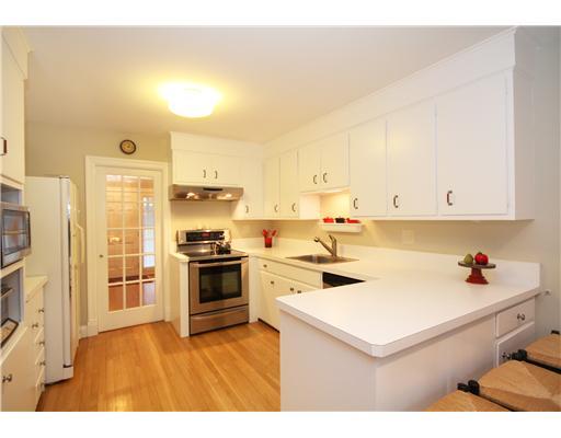 58 Stanton Road Darien, CT 06820 - Photo 7 of 17 a kitchen that has a sink and white cabinets