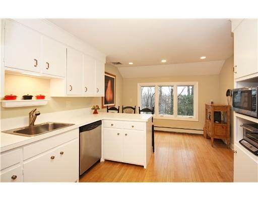 58 Stanton Road Darien, CT 06820 - Photo 8 of 17 a kitchen with a sink stove and cabinets