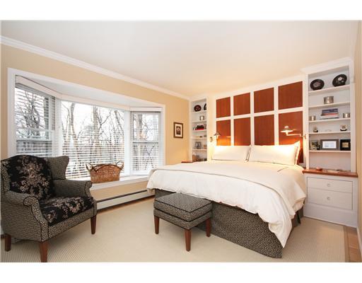 58 Stanton Road Darien, CT 06820 - Photo 10 of 17 a bedroom with a bed couch and a large window