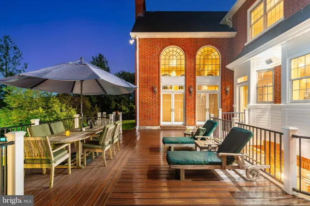 a outdoor space with furniture and wooden floor