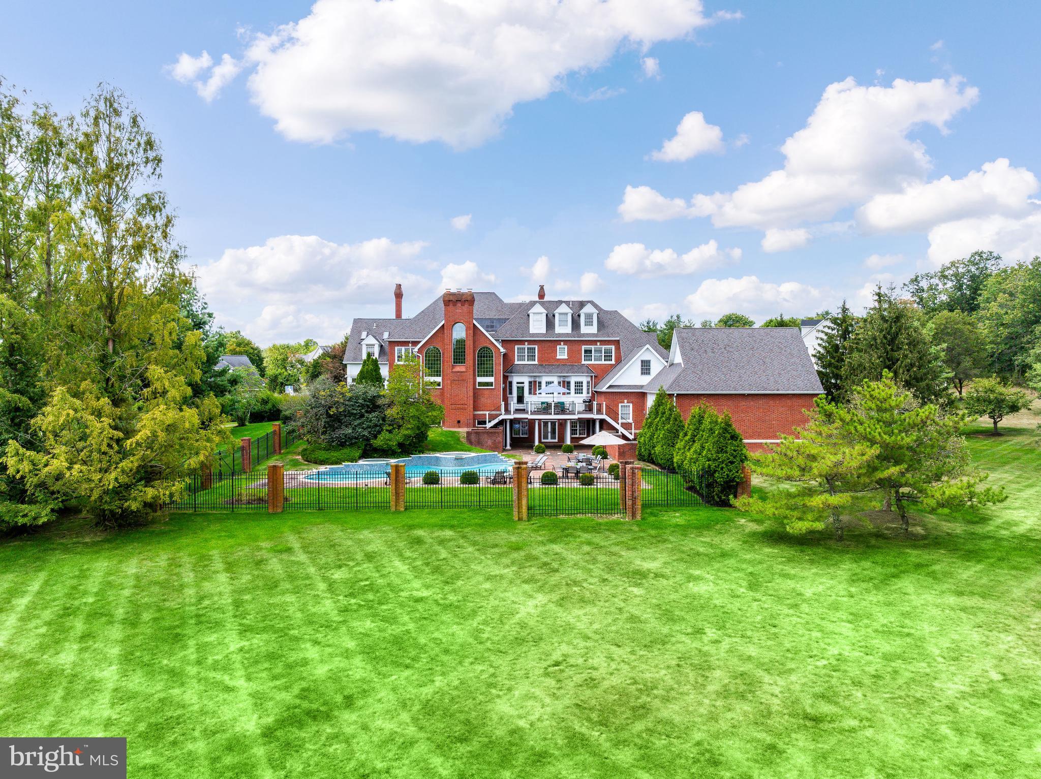 110 Brittany Way Blue Bell, PA 19422 - Photo 17 of 27 a view of a house with a big yard and a large tree