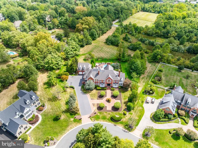 an aerial view of residential house with an outdoor space