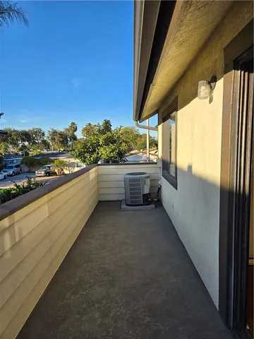 a view of balcony and kitchen