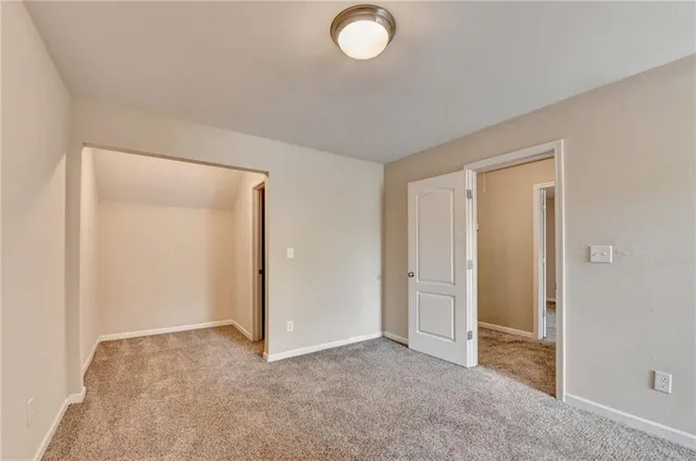 a view of a house with yard and porch