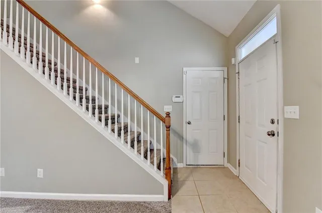 a view of a hallway with staircase