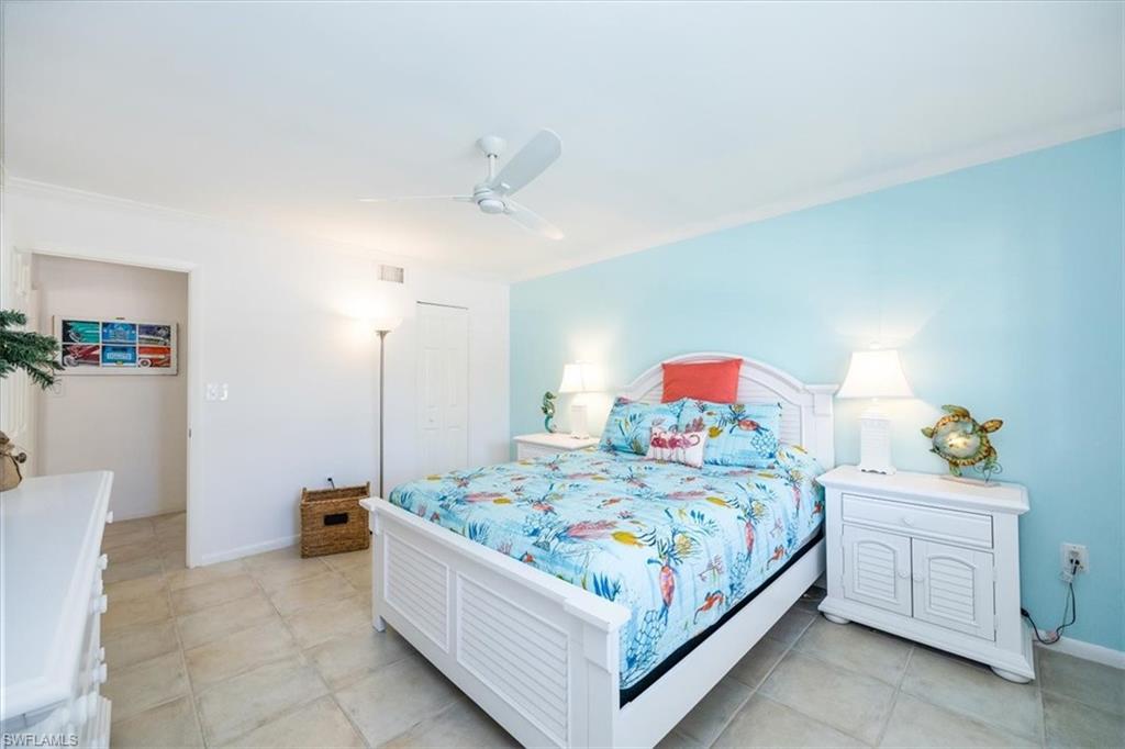 3200 Binnacle Drive, Unit C4 Naples, FL 34103 - Photo 17 of 24 Bedroom with visible vents, baseboards, a closet, and a ceiling fan