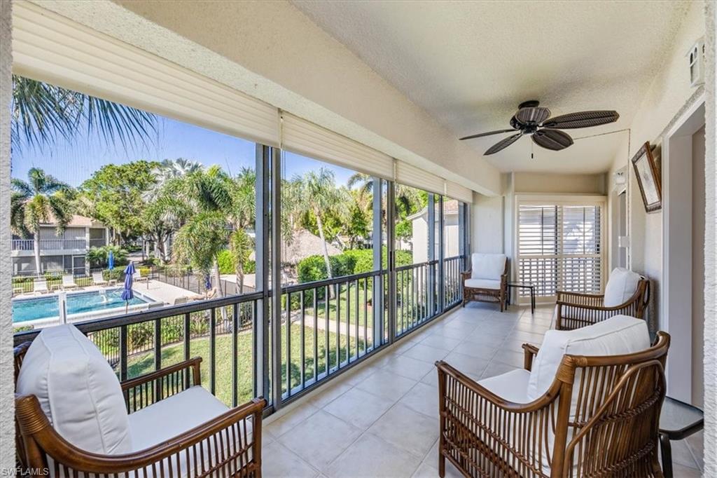3200 Binnacle Drive, Unit C4 Naples, FL 34103 - Photo 20 of 24 Sunroom with visible vents and ceiling fan