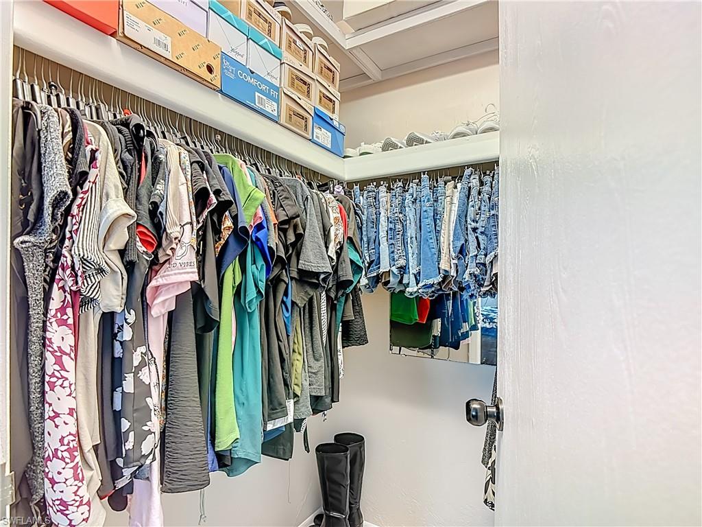 1201 Barrett Road, Unit 1204 North Fort Myers, FL 33903 - Photo 26 of 31 a view of walk in closet with clothes