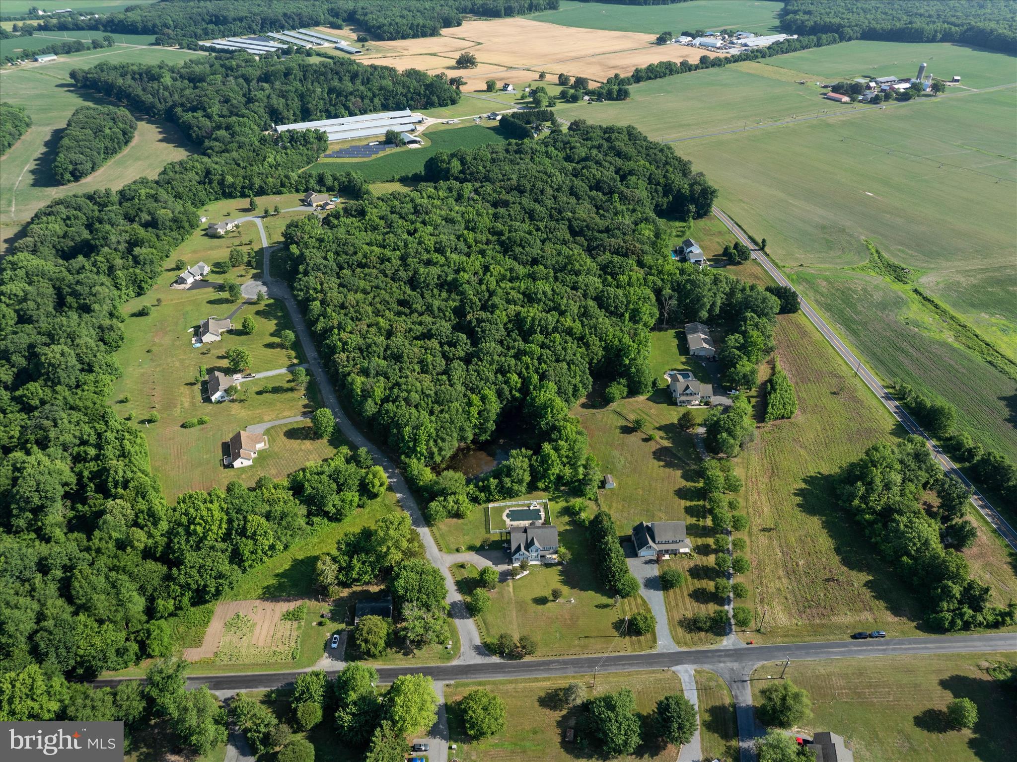 913 Clark Corner Road Centreville, MD 21617 - Photo 56 of 66 an aerial view of a house with a yard