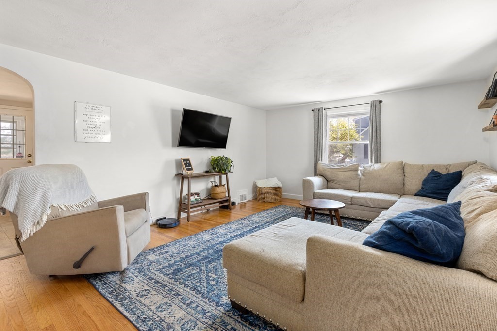 53 Wilson Street Ludlow, MA 01056 - Photo 12 of 26 a living room with furniture and a flat screen tv