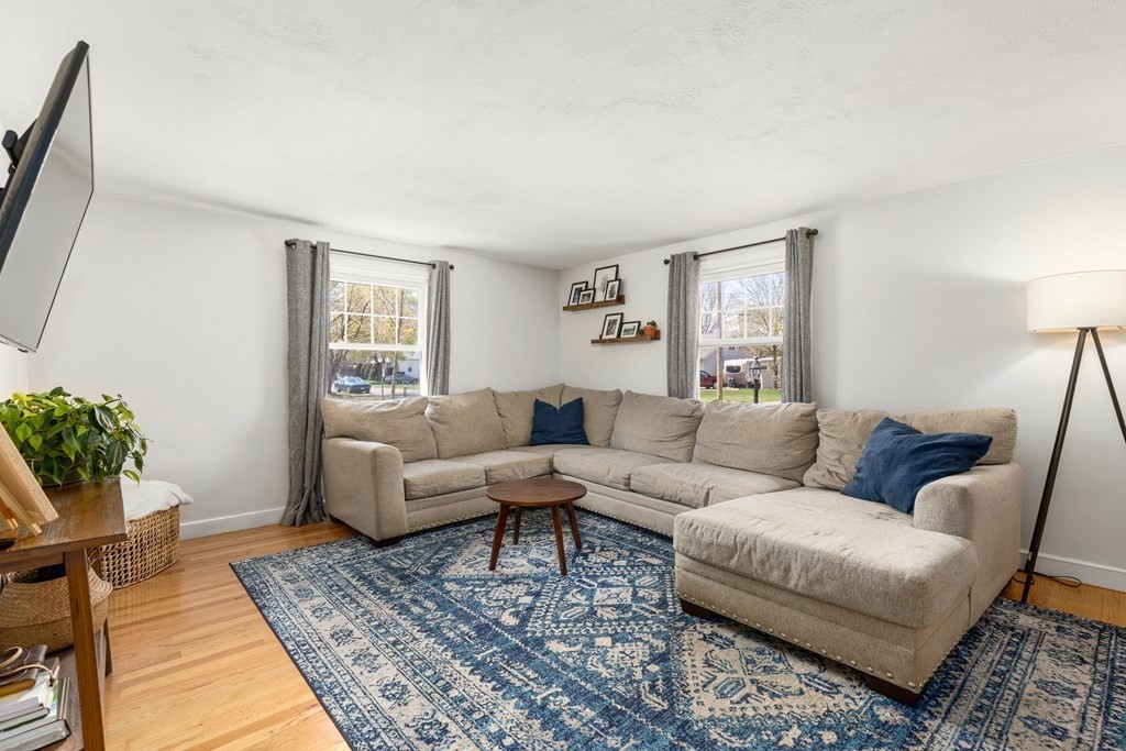 53 Wilson Street Ludlow, MA 01056 - Photo 15 of 26 a living room with furniture and a couch