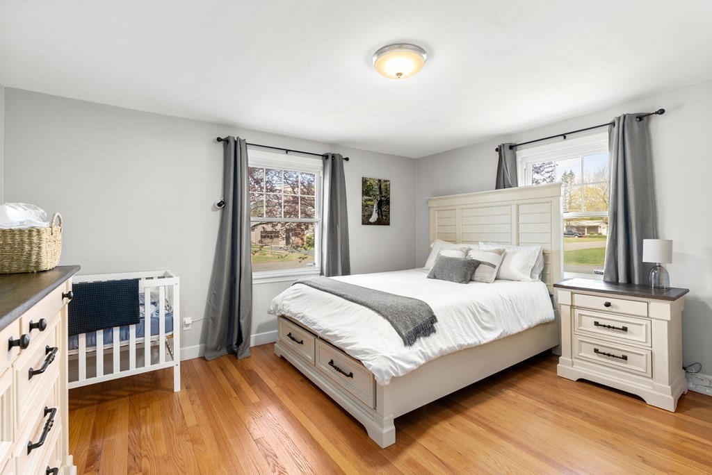 53 Wilson Street Ludlow, MA 01056 - Photo 17 of 26 a bedroom with a bed and a dresser
