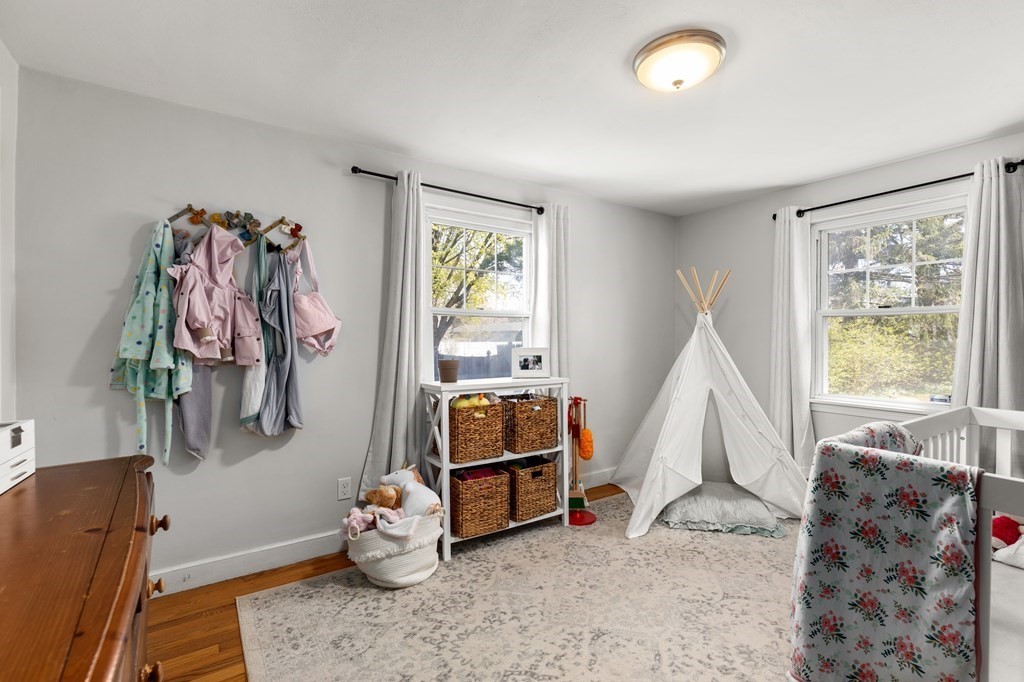 53 Wilson Street Ludlow, MA 01056 - Photo 19 of 26 a view of a bedroom with furniture and window