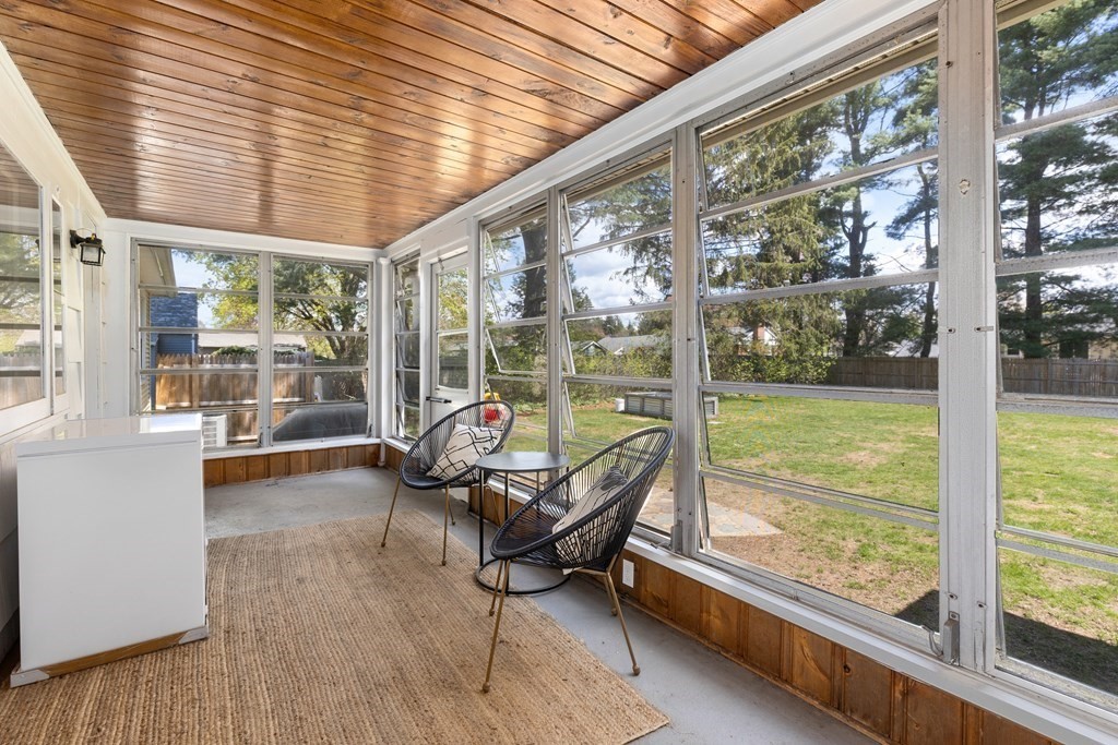 53 Wilson Street Ludlow, MA 01056 - Photo 20 of 26 a living room with furniture and floor to ceiling windows