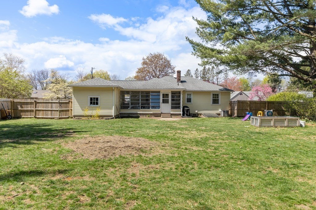 53 Wilson Street Ludlow, MA 01056 - Photo 24 of 26 a front view of a house with a garden