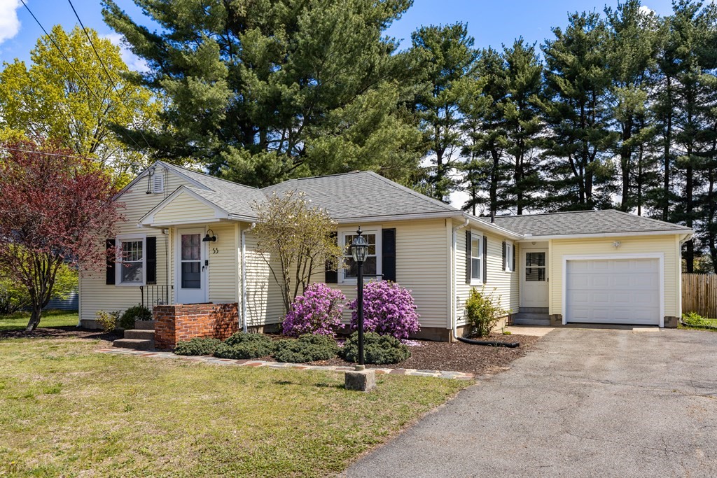 53 Wilson Street Ludlow, MA 01056 - Photo 5 of 26 a front view of house with yard