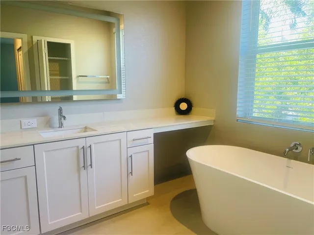 a bathroom with a sink and a bathtub