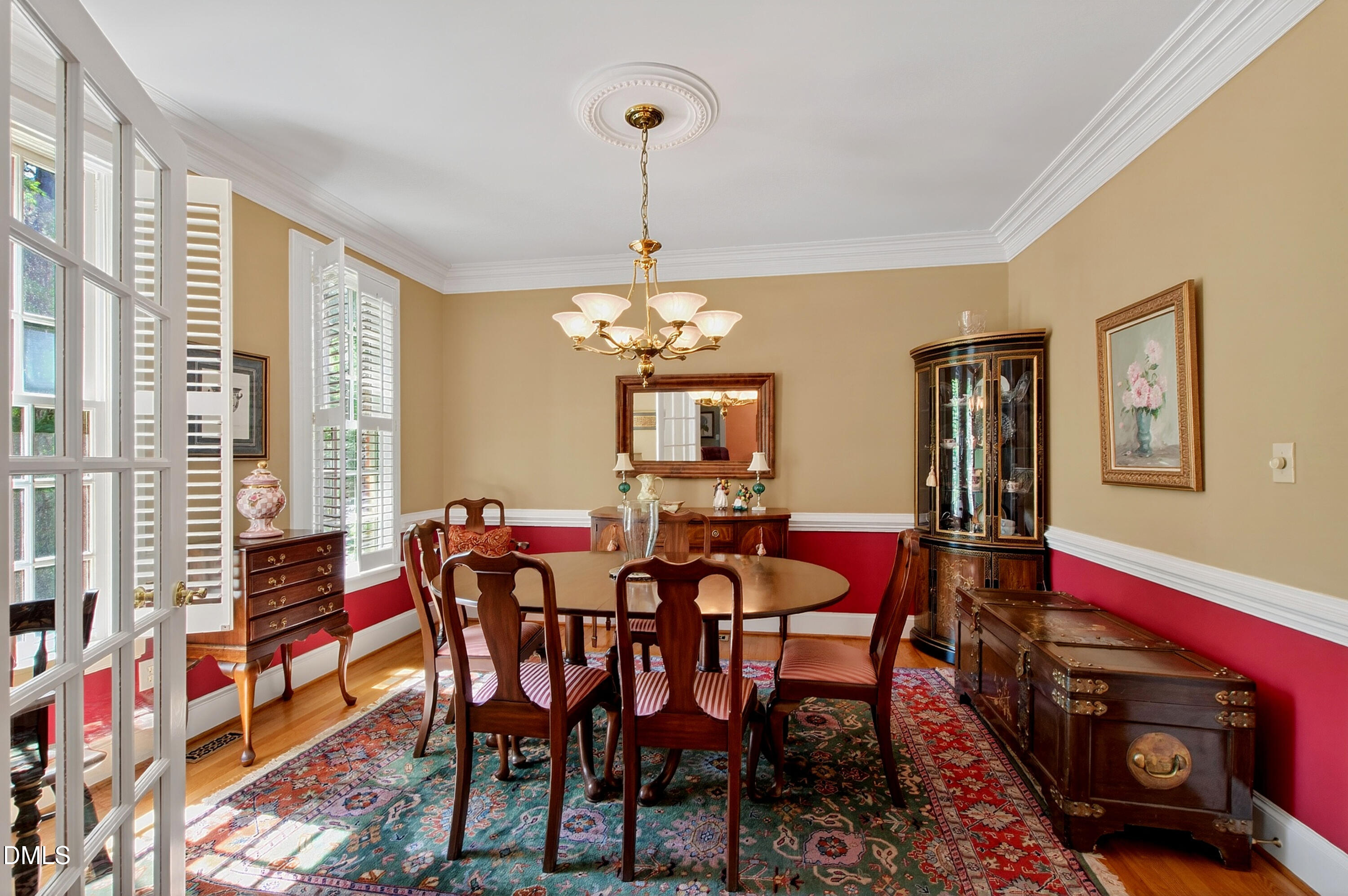 3708 Lubbock Drive Raleigh, NC 27612 - Photo 8 of 64 a view of a dining room with furniture and chandelier