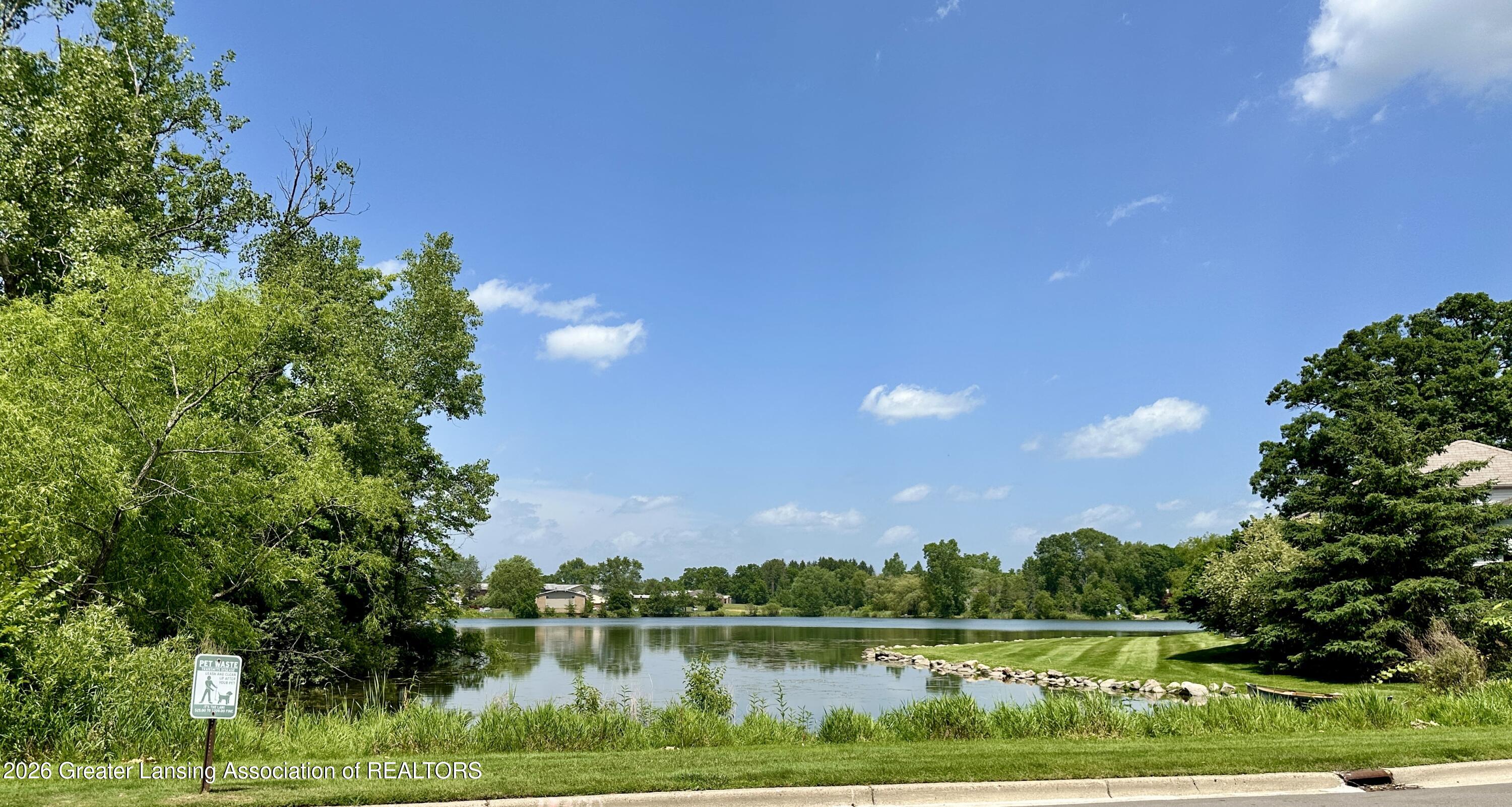 2059 La Mer Lane, Unit 17 Haslett, MI 48840 - Photo 45 of 48 Community Pond