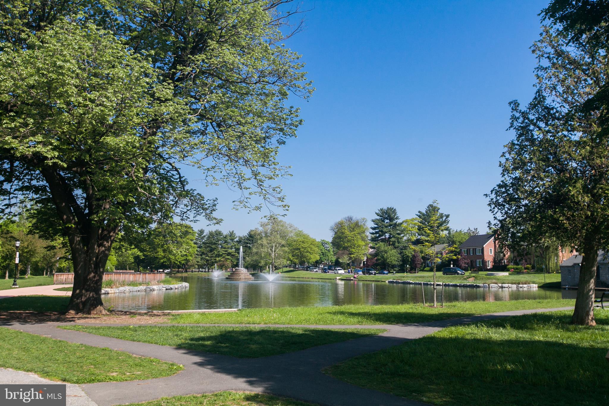 318 North Market Street, Unit A Frederick, MD 21701 - Photo 8 of 10 a view of a lake with a house in the background
