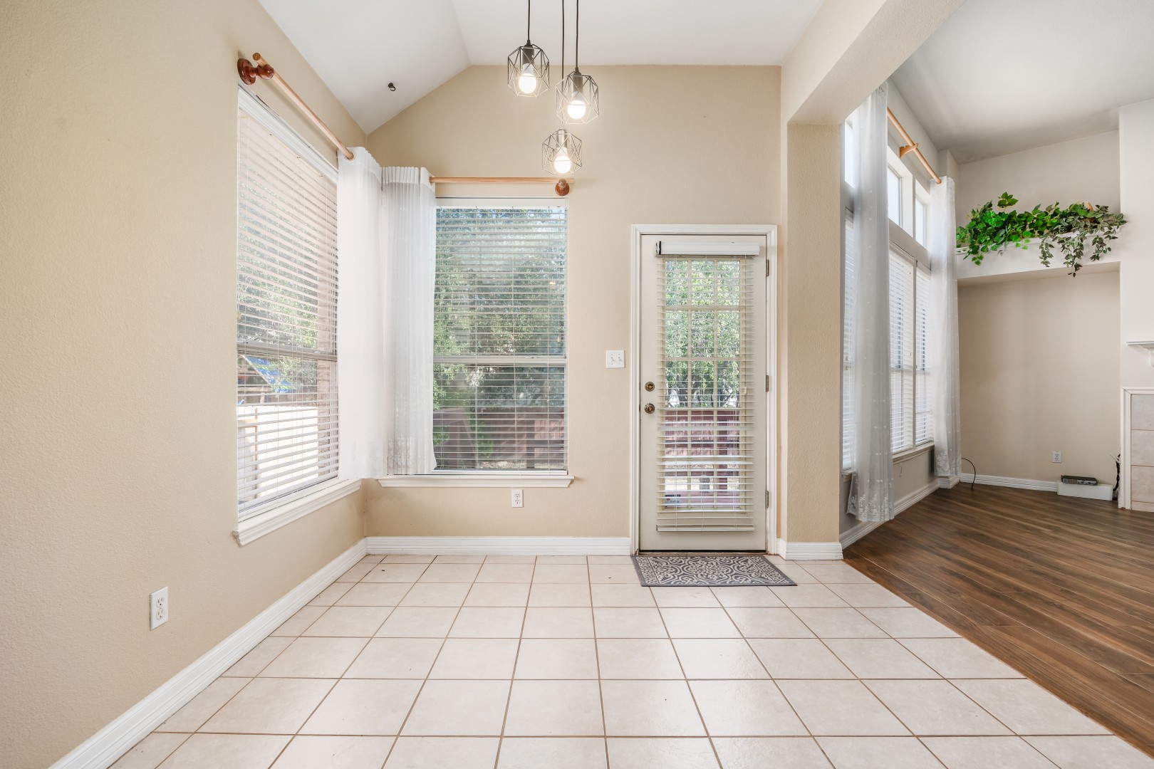 1108 Antelope Ridge Cedar Park, TX 78613 - Photo 16 of 39 Tiled flooring and high ceilings define this versatile dining area near the back entryway.