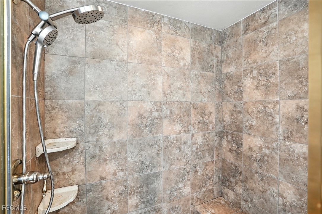 2373 Summerall Road LaBelle, FL 33935 - Photo 19 of 47 a bathroom with a toilet and a shower