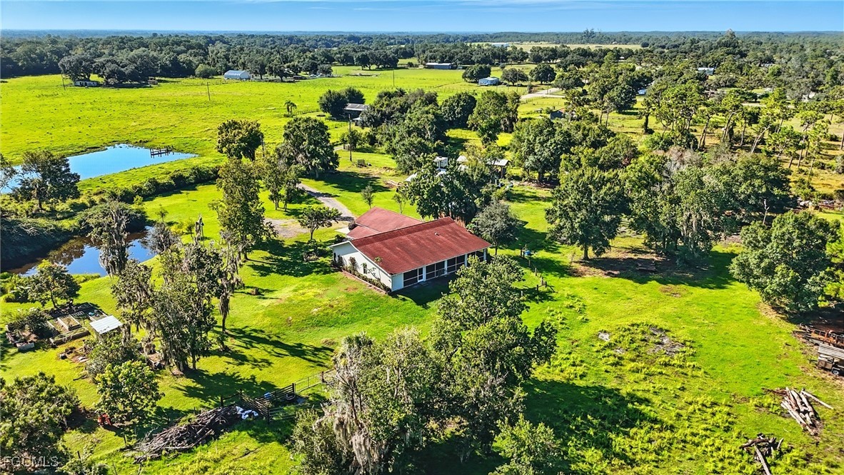 2373 Summerall Road LaBelle, FL 33935 - Photo 39 of 47 a view of a yard with an outdoor space