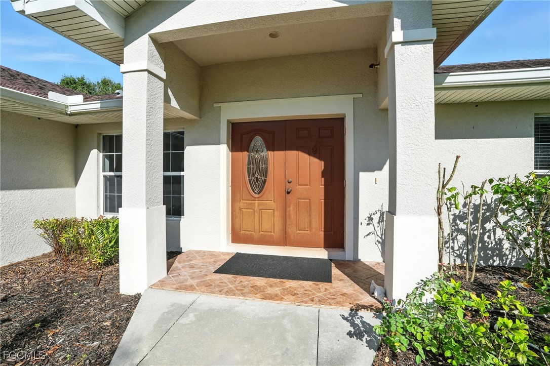 2373 Summerall Road LaBelle, FL 33935 - Photo 6 of 47 a front view of a house with a outdoor space