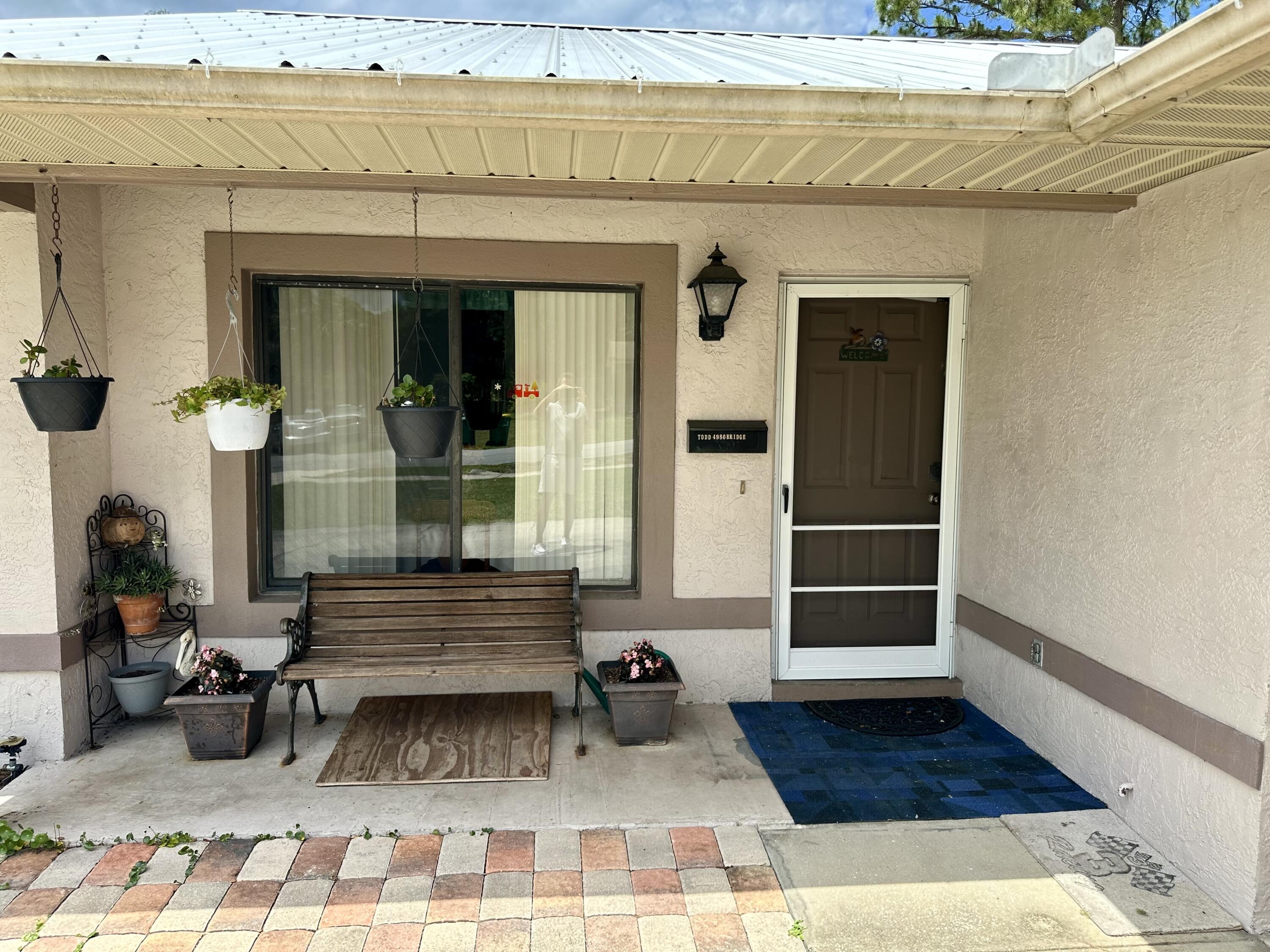 4980 Bridge Road Cocoa, FL 32927 - Photo 22 of 24 a view of entryway with a rug