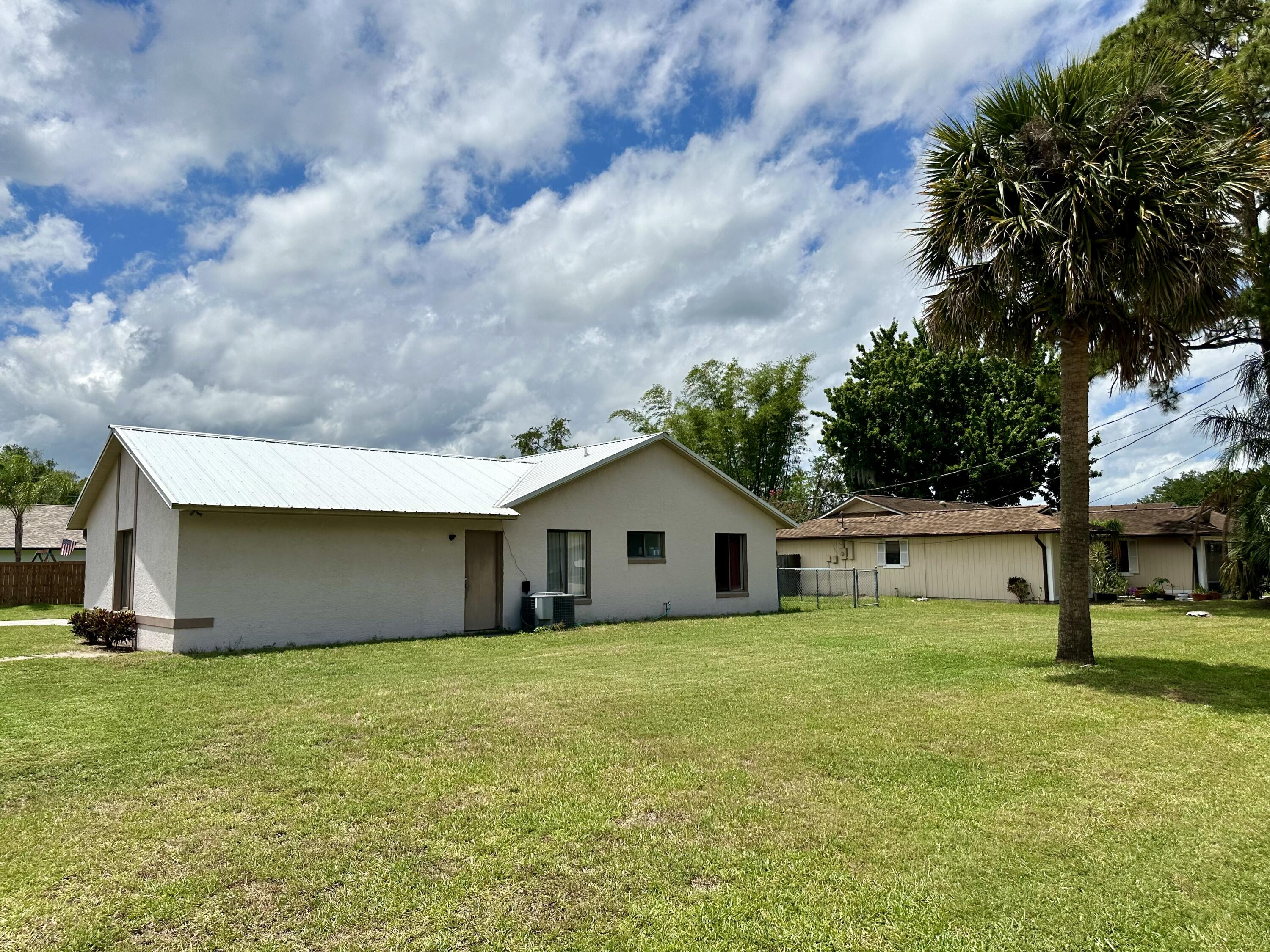 4980 Bridge Road Cocoa, FL 32927 - Photo 3 of 24 a view of house with garden