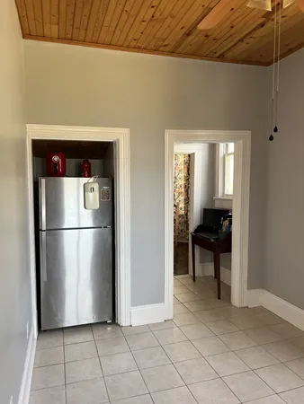 a view of a utility room with closet